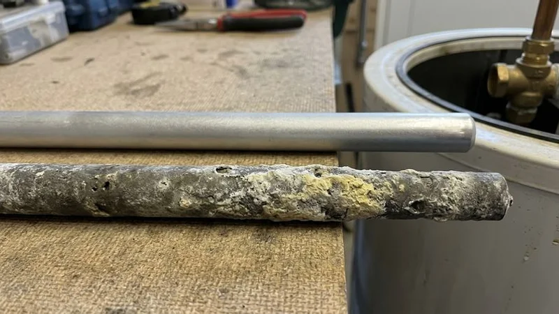 Comparison of a new sacrificial anode versus a fully corroded anode rod